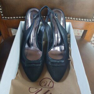 Classic black leather heels . New and Unworn.